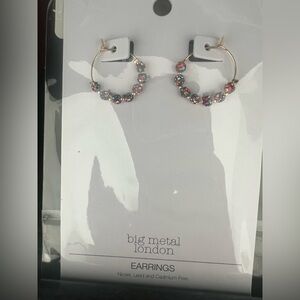 Brand new earrings. Big city metal